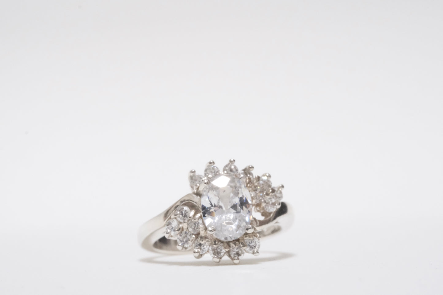 Oval center CZ with Small round CZ 925 Silver Ring